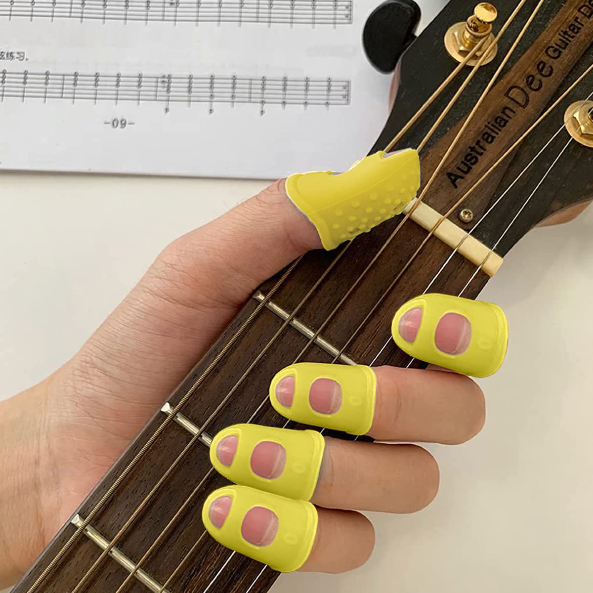 PATPAT 10Pcs Guitar Finger Protector, 20mm Silicone Guitar Fingertips Guards, Anti Slip Fingertip Protectors, Finger Picks Protector Plectrum Anti-Scalding for Guitar Playing Men Women Yellow PATPAT 10Pcs Guitar Finger Protector, 20mm Silicone Guitar Fingertips Guards, Anti Slip Fingertip Protectors, Finger Picks Protector Plectrum Anti-Scalding for Guitar Playing Men Women Yellow